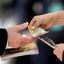 Money changing hands
