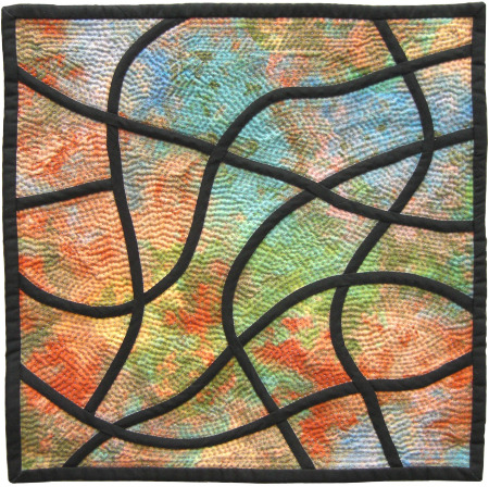 handmad quilt of a stained glass mosaic