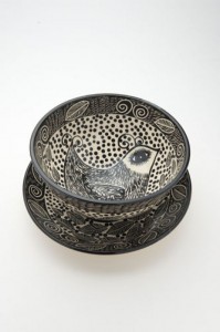 Bowl and plate with painted bird