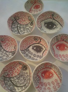Handpainted pinched ceramic dishes with birds