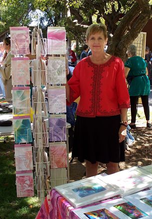 woman with greeting card rack