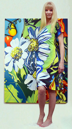 Artist Anne Gudrun in her "Daisy" dress with original painting