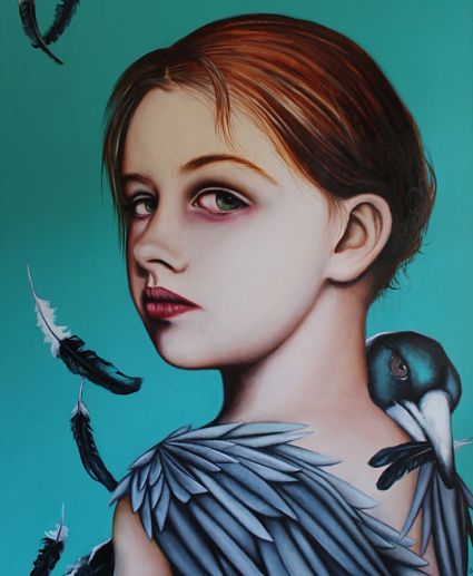 Young girl with feathers