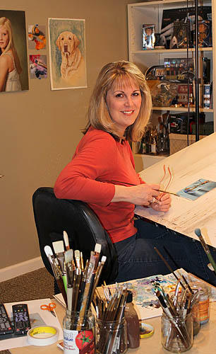 Artist Lisa Ober in her studio