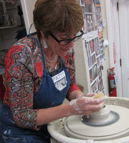Ceramic artist Patricia Griffin working in her studio
