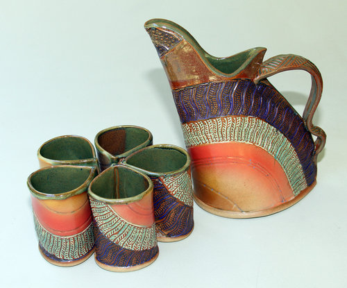 Pitcher with set of five cups