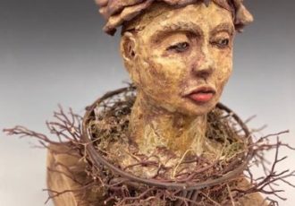 ceramic sculpture of a woman's head by Mary McGill