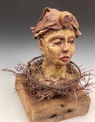 ceramic sculpture of a woman's head by Mary McGill