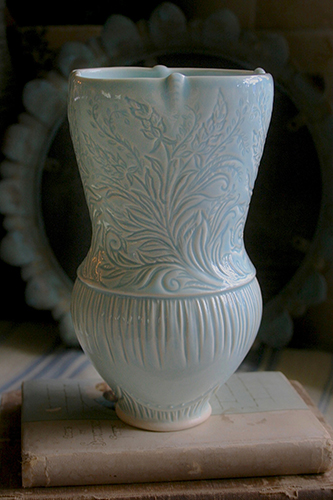 Hand thrown carved porcelain vessel by Grace DePledge