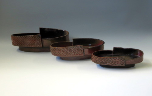 Epicurean Sculptureware; Rust with Black Accents,3 piece Elliptical Set