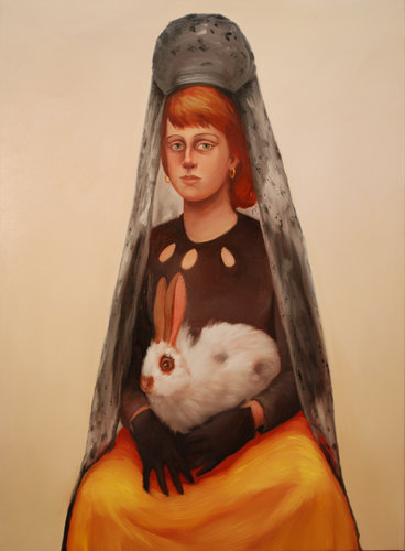 Woman Holding a White Rabbit