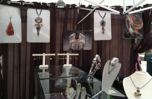 Leon and Eva Oziel jewelry booth