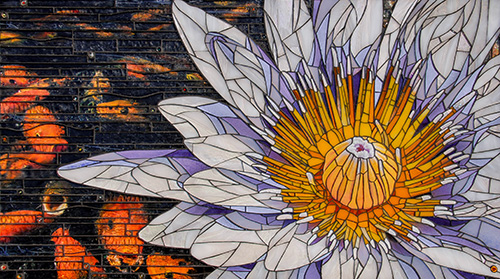 "Water Lily" mosaic made from stained glass, murano millefiori, river rock and original photography under the glass, 21" x 35" x 2" by artist Cherie Bosela. See her incredible portfolio at www.ArtsyShark.com