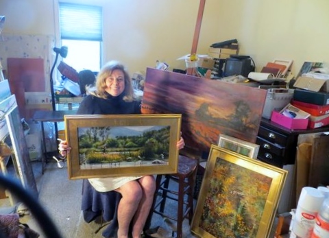 Artist Shirley Cleary with painting