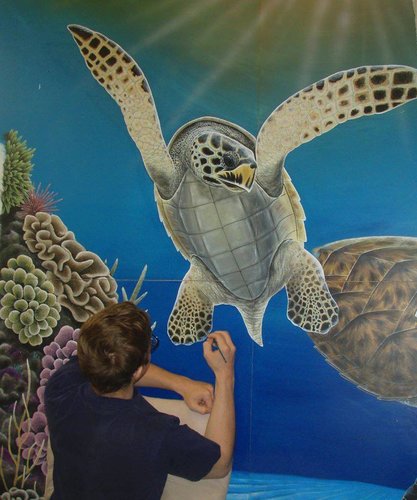 Artist Ryan Sobel working on "Sea Turtle and Reef" mural by Ryan Sobel. See his portfolio by visiting www.ArtsyShark.com