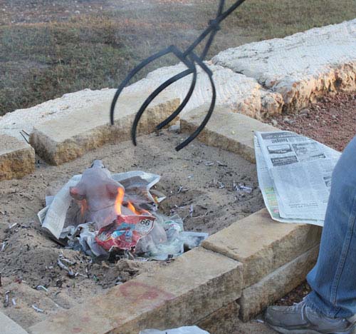 Raku Process -into the fire by artist Theresa McCarthy Sayer. See her portfolio by visiting www.ArtsyShark.com