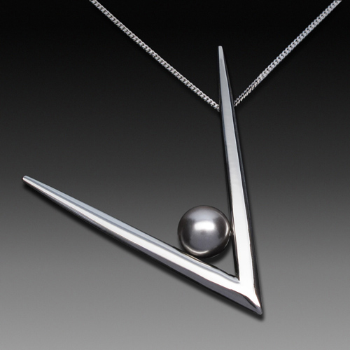 "Angularity" Pendant, Sterling Silver Fork Tines, Tahitian Pearl, 2” x 2” x 1” by artist Don Kelley. See his portfolio by visiting www.ArtsyShark.com