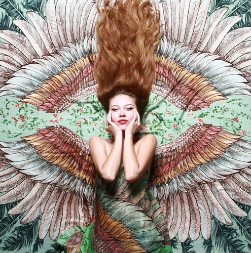 Green winged scarf by artist Roza Khaminova is available at her online store, Shovava. Read her story at www.ArtsyShark.com