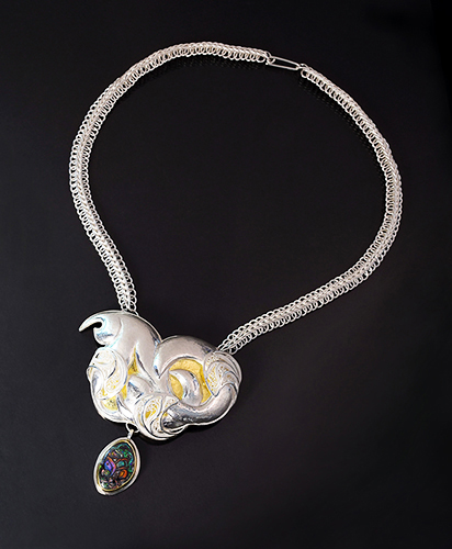“Embody” Gold, Sterling and Koroit Opal Pendant with Chain, 3 ¼”L x 3”W x ¾”H, Length 20” by artist Victoria Lansford. See her portfolio by visiting www.ArtsyShark.com