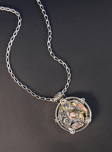 “Relativity Navigator” Gold, Sterling and Koroit Opal Pendant, 1 7/8” x 5/8”, Chain 24” by artist Victoria Lansford. See her portfolio by visiting www.ArtsyShark.com