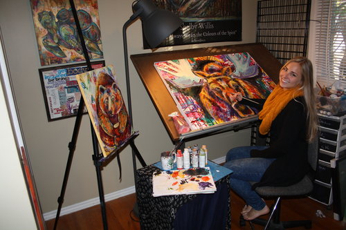 Artist Shelby Willis in her studio. See her portfolio by visiting www.ArtsyShark.com