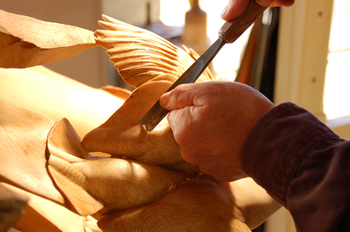 Artist Ken Newman carving wood. See artist Ken Newman's portfolio by visiting www.ArtsyShark.com