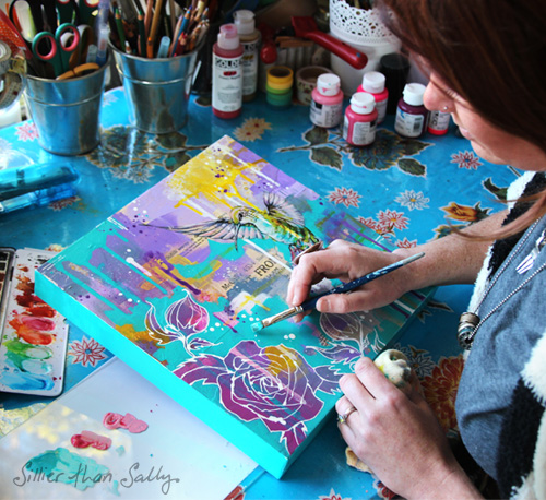 Sally Walsh (aka: Sillier Than Sally) creating mixed media art in her studio. See her portfolio by visiting www.ArtsyShark.com
