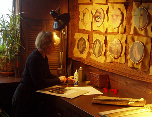 Artist Joan Hall in her studio. See her portfolio by visiting www.ArtsyShark.com