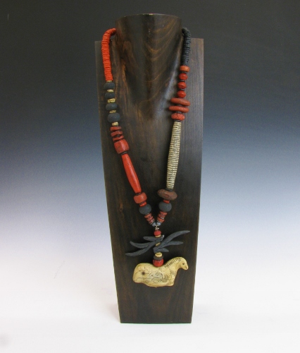 “Shaman Necklace: Coral Horse Clan” Polymer Clay, 38” L by artist Luann Udell. See her portfolio by visiting www.ArtsyShark.com