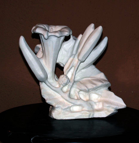 “Datura Anna” White Marble, 9.5” x 6.25” x 10.5”by artist Jack Inson. See his portfolio by visiting www.ArtsyShark.com 