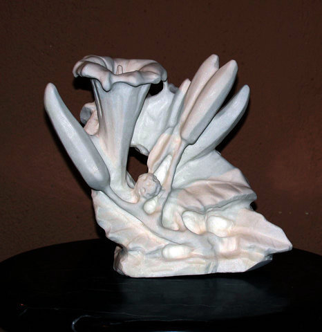 “Datura Anna” White Marble, 9.5” x 6.25” x 10.5”by artist Jack Inson. See his portfolio by visiting www.ArtsyShark.com