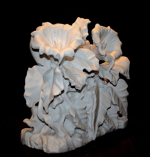 “Sacred Datura” (back view) White Marble, 11” x 12” x 6” by artist Jack Inson. See his portfolio by visiting www.ArtsyShark.com