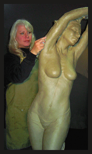 Artist Bren Sibilsky working on a sculpture. See her artist feature at www.ArtsyShark.com