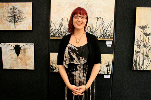 Artist Shannon Amidon in her booth. See her portfolio by visiting www.ArtsyShark.com
