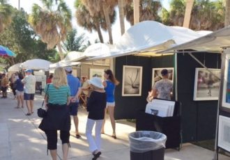 Shoppers at an art fair.