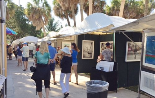 Shoppers at an art fair.