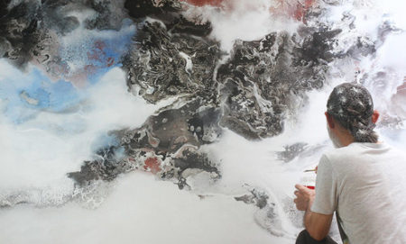 Artist Calvin Teng at work in his studio. See his portfolio by visiting www.ArtsyShark.com