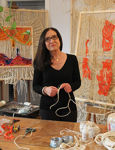 Artist Andie Grande in her workshop. See her portfolio by visiting www.ArtsyShark.com