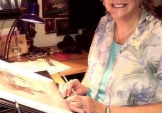 Artist Patricia Mitchell at work in her studio.