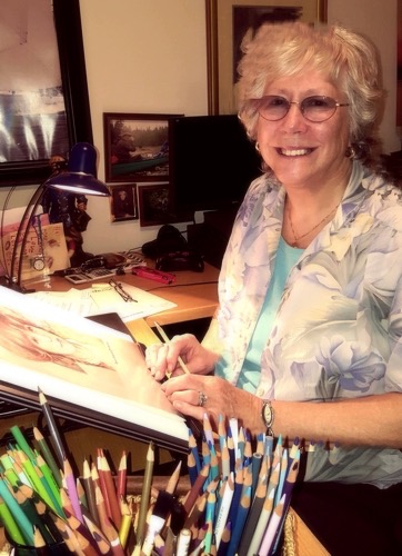 Artist Patricia Mitchell at work in her studio.