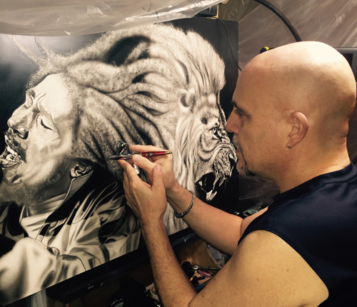 Artist Dan Menta working on a new painting - “Bob Marley (TIGER HEART)” Acrylic on Clay-board, 2’ x 3'. See his portfolio by visiting www.ArtsyShark.com