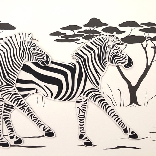 "Chasing Zebras" Paper Cutting, 24" x 12" by artist Eleanor Goudreau. See her portfolio by visiting www.ArtsyShark.com