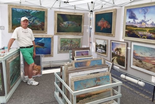 Artist Keith Martin Johns in his art show booth