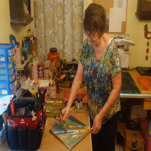 Artist Sylvia Larkin at work in her studio