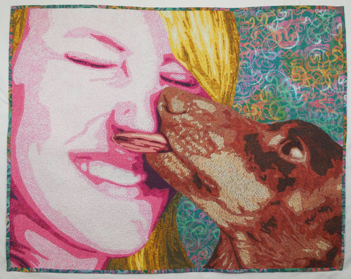 “Puppy Love” Fiber, 36” x 28” by artist Lea McComas. See her portfolio by visiting www.ArtsyShark.com