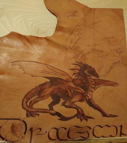 “Celtic Dragon Map” Burned on Leather, 23” x 18” by artist Marsha Wilson. See her portfolio by visiting www.ArtsyShark.com