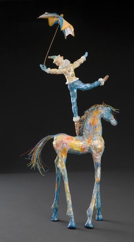 “Chagall’s Acrobat” Ceramic Mixed Media Sculpture, 8” x 27” x 7” by artist Mindy Colton. See her portfolio by visiting www.ArtsyShark.com