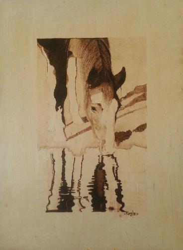 “Reflections of a Horse” Wood Burned on Baltic Birch Board, 23” x 14” by artist Marsha Wilson. See her portfolio by visiting www.ArtsyShark.com