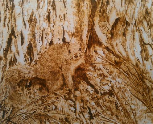 “Squirrel” Burned on Paper, 10.5” x 9” by artist Marsha Wilson. See her portfolio by visiting www.ArtsyShark.com