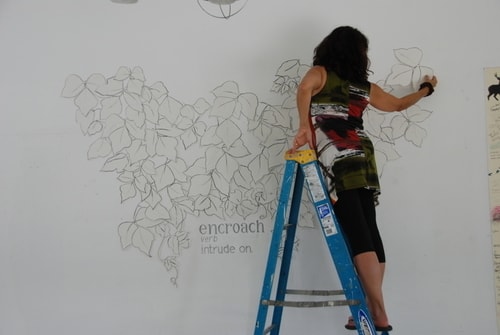 “Encroach” (View of artist installing in situ at VCCA Residency) Paper Collage and Collaborative Music, Size is Variable by artist Lilianne Milgrom. See her portfolio by visiting www.ArtsyShark.com